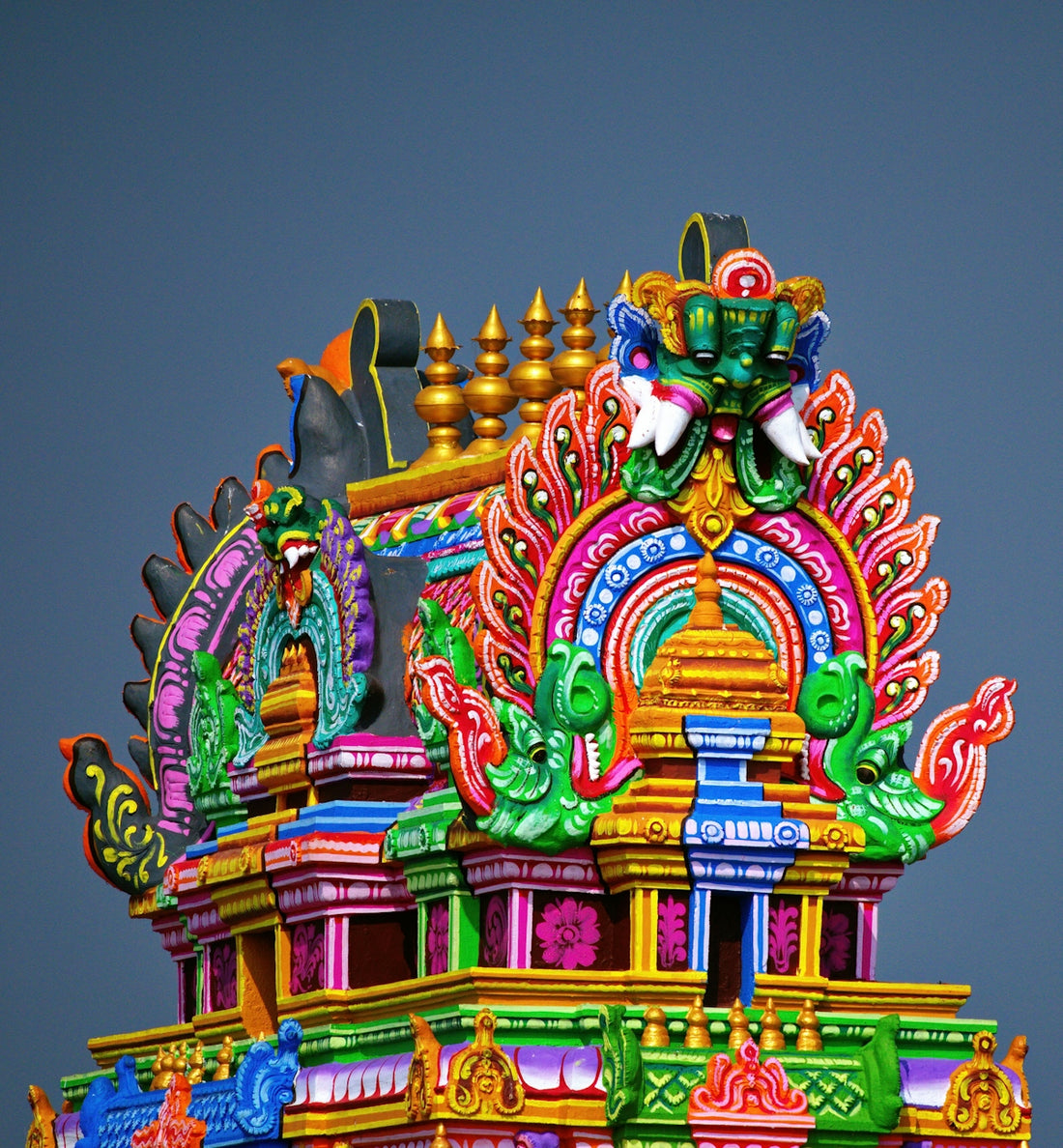 green yellow and red dragon statue