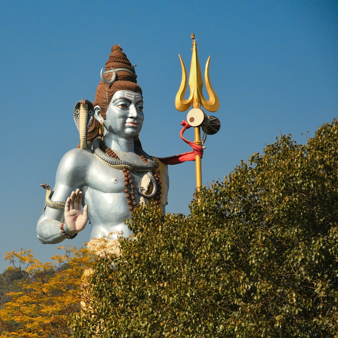 a statue of a person holding a sword