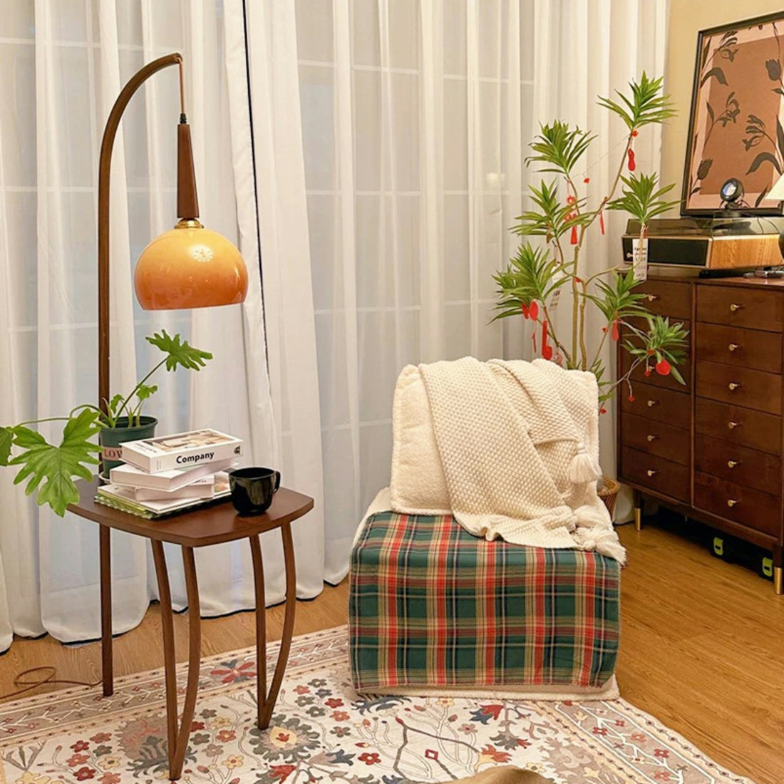 A cozy corner with vintage furniture and decor