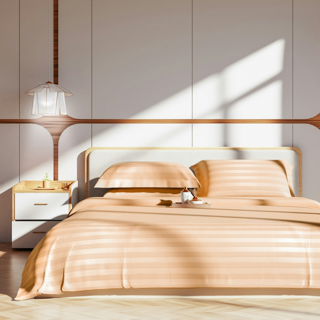 A cozy bedroom with peach-colored bedding.