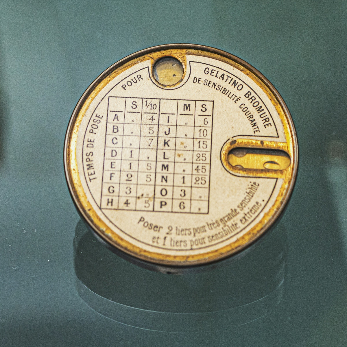 Vintage photographic exposure calculator dial