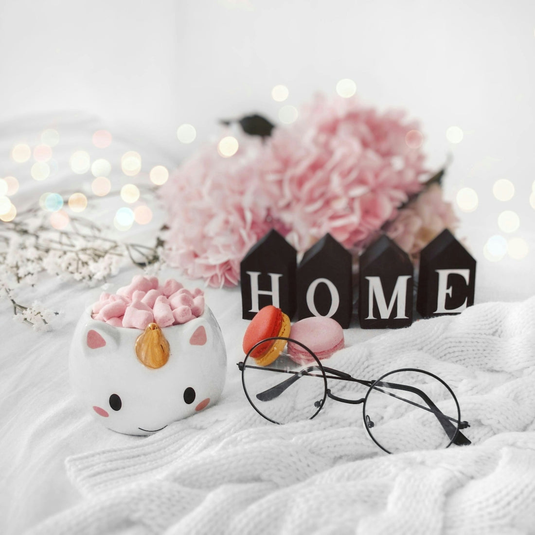 Cozy home decor with unicorn mug and flowers