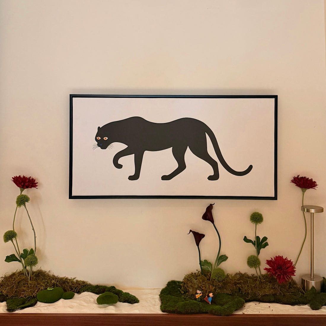 Black panther silhouette on white background with flowers