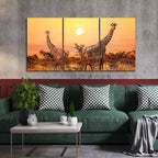 A Beautiful 3 Pieces Wall Painting of Giraffes Sunset in Background DECORMANTRA