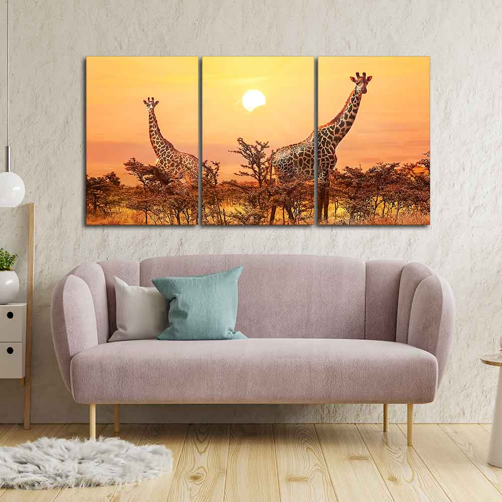 A Beautiful 3 Pieces Wall Painting of Giraffes Sunset in Background DECORMANTRA