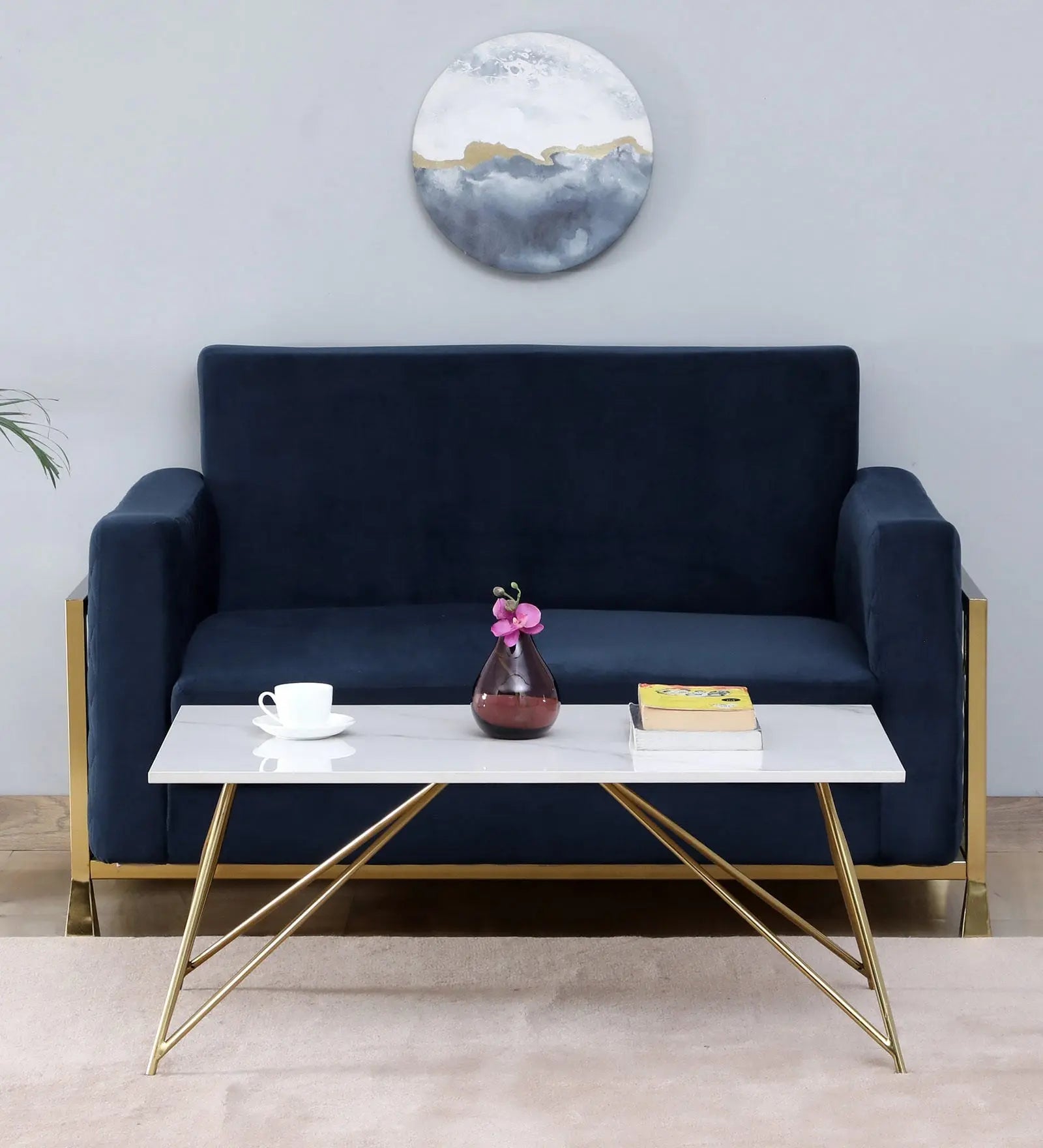 Coffee Table with Elegant Porcelain Top and Matte Gold Finish DECORMANTRA