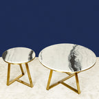 Four-Leg Coffee Table with Gold Detailing & Three-Legged Gold Accent Table DECORMANTRA