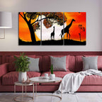 Premium 3 Pieces Wall Painting of Pair of Giraffe under a Tree in Sunset DECORMANTRA